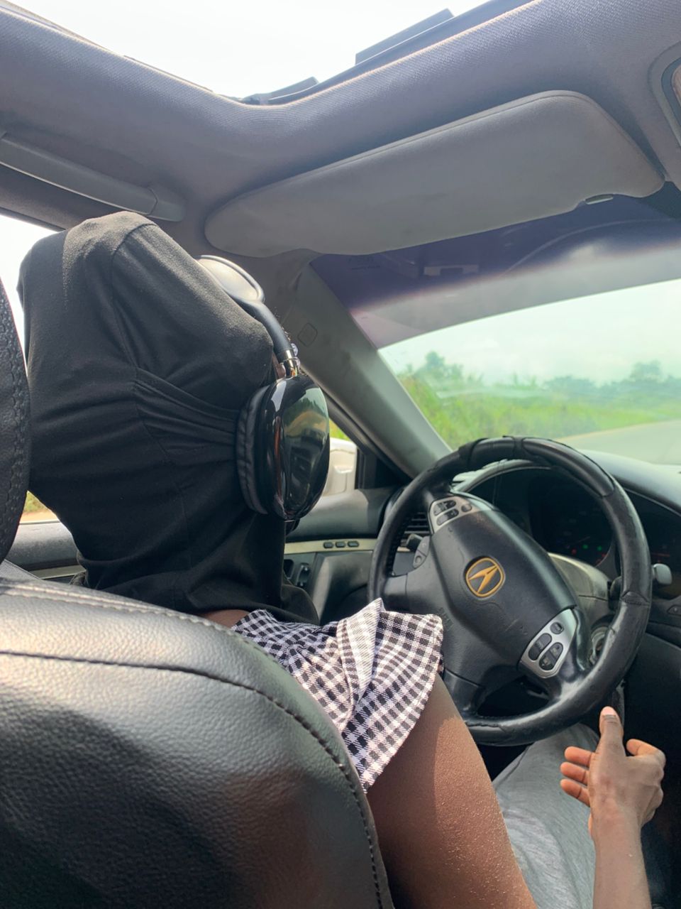 Female driver inside a vehicle on the road